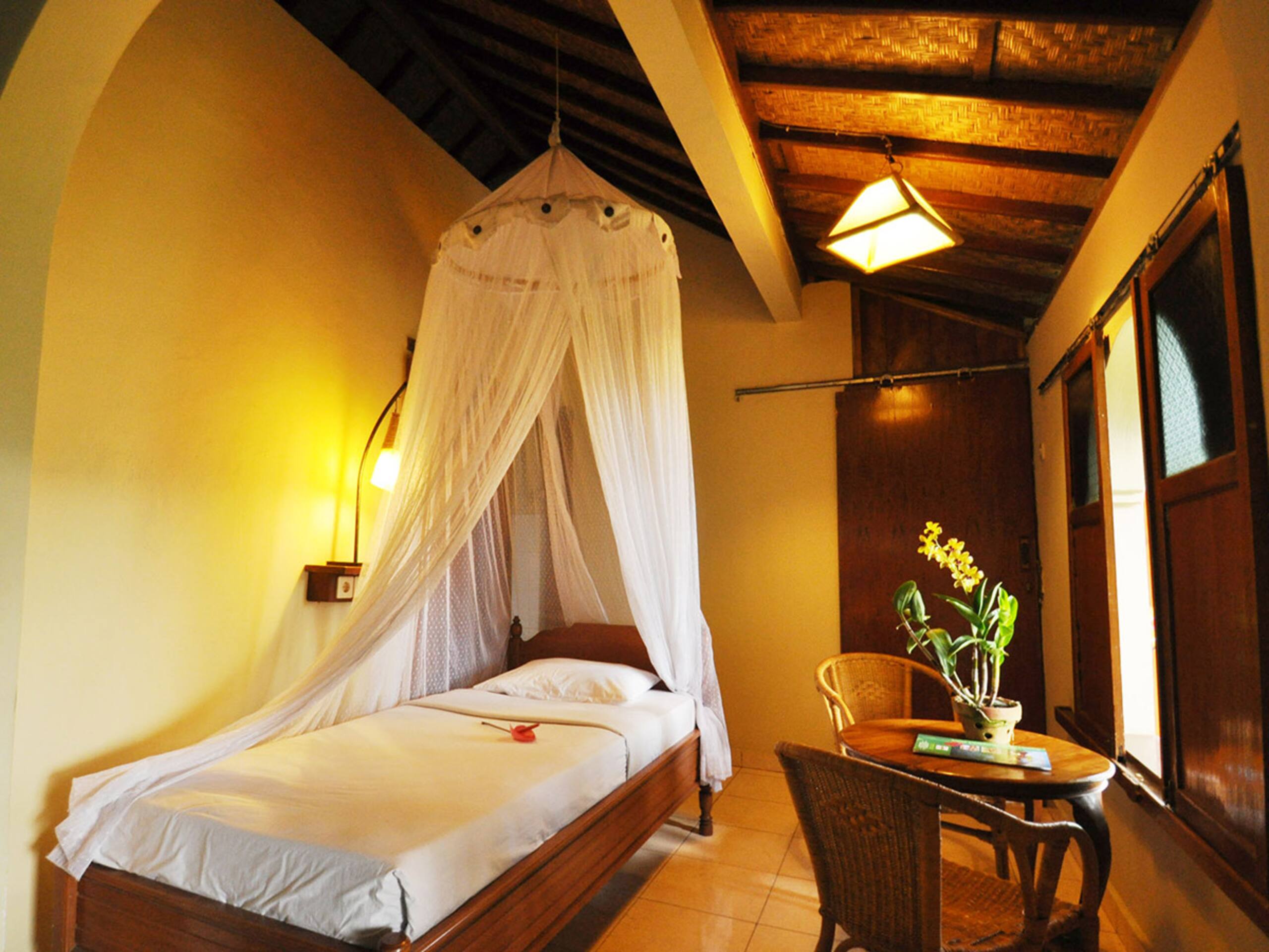 Puri Lumbung Cottages, Economy Room Garden View — photo 5