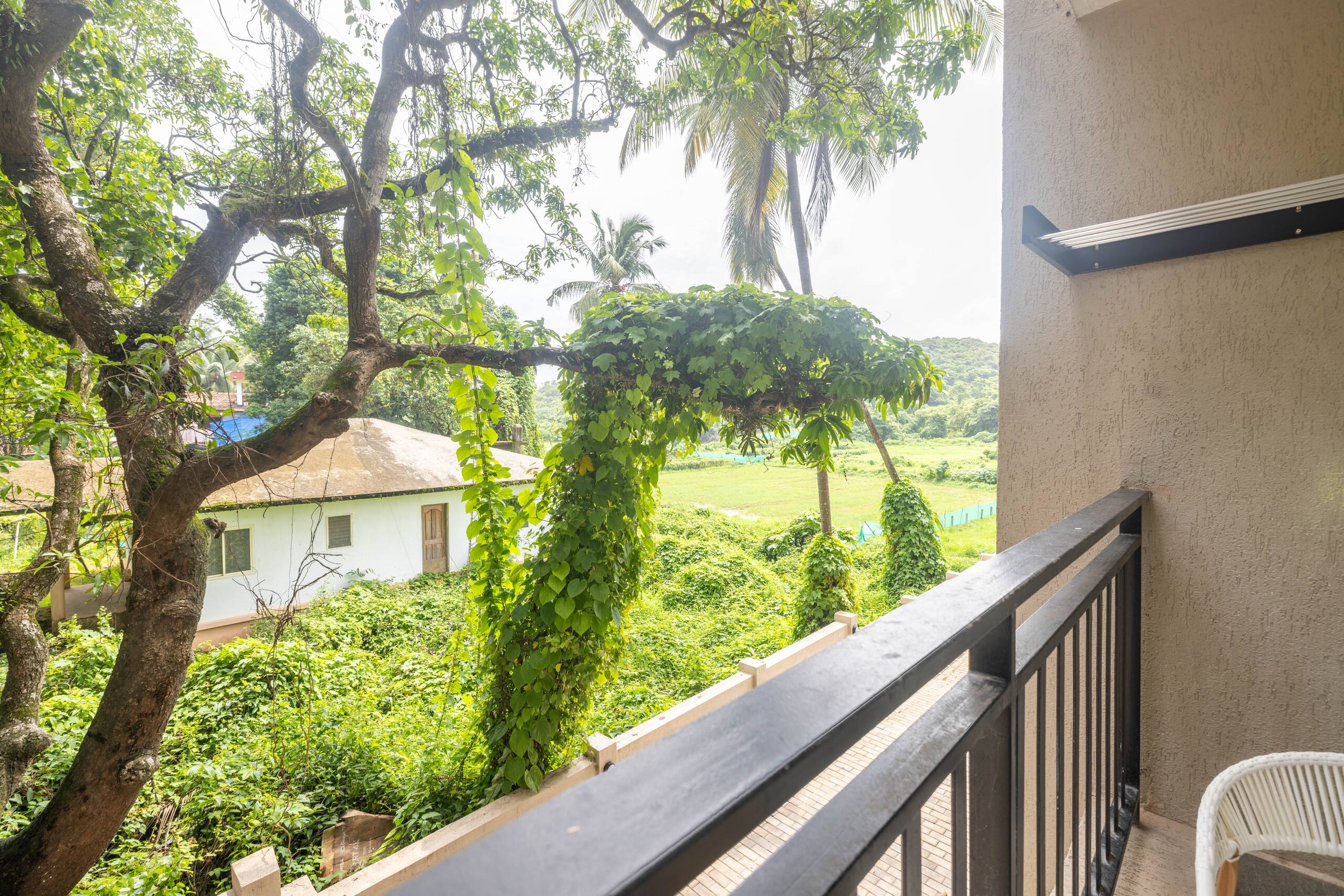 Cozy 2BR Candolim Escape | Pool, Gym & Hill Views 28
