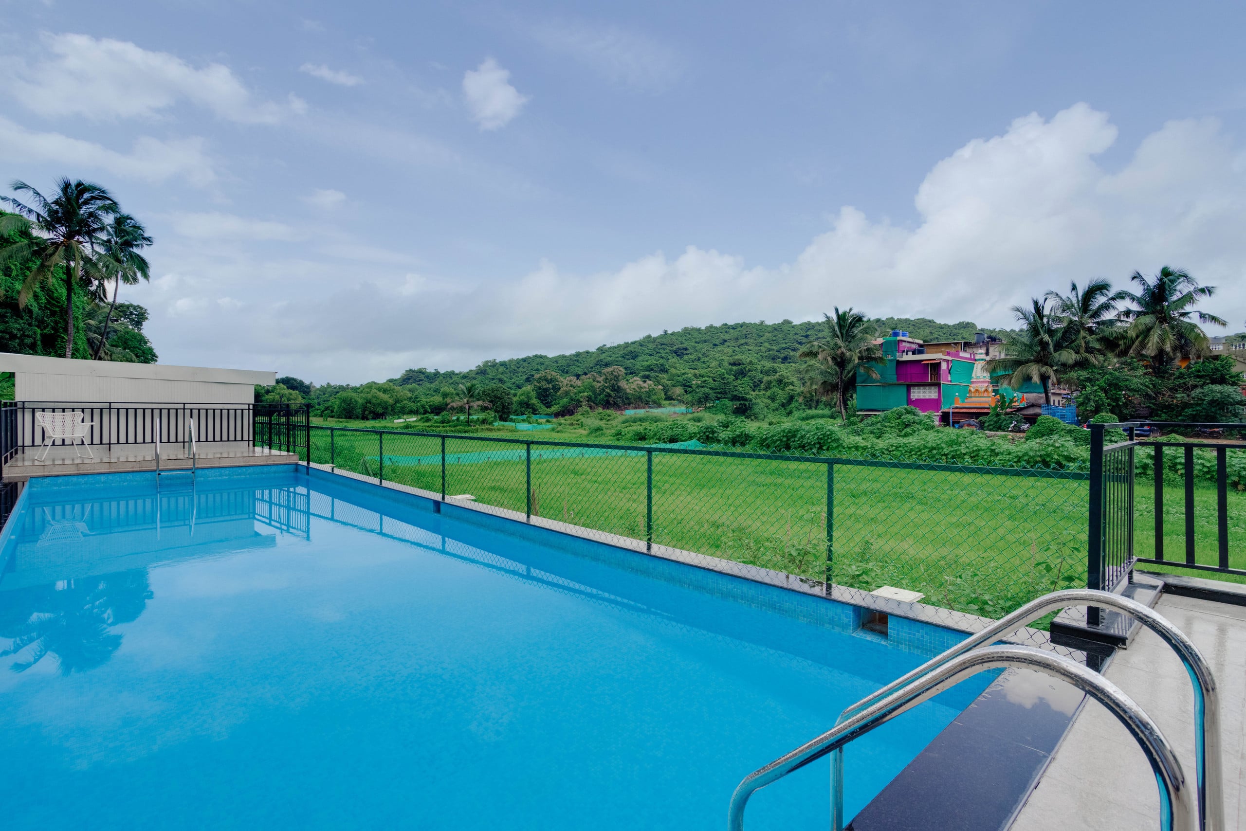 Cozy 2BR Candolim Escape | Pool, Gym & Hill Views 37