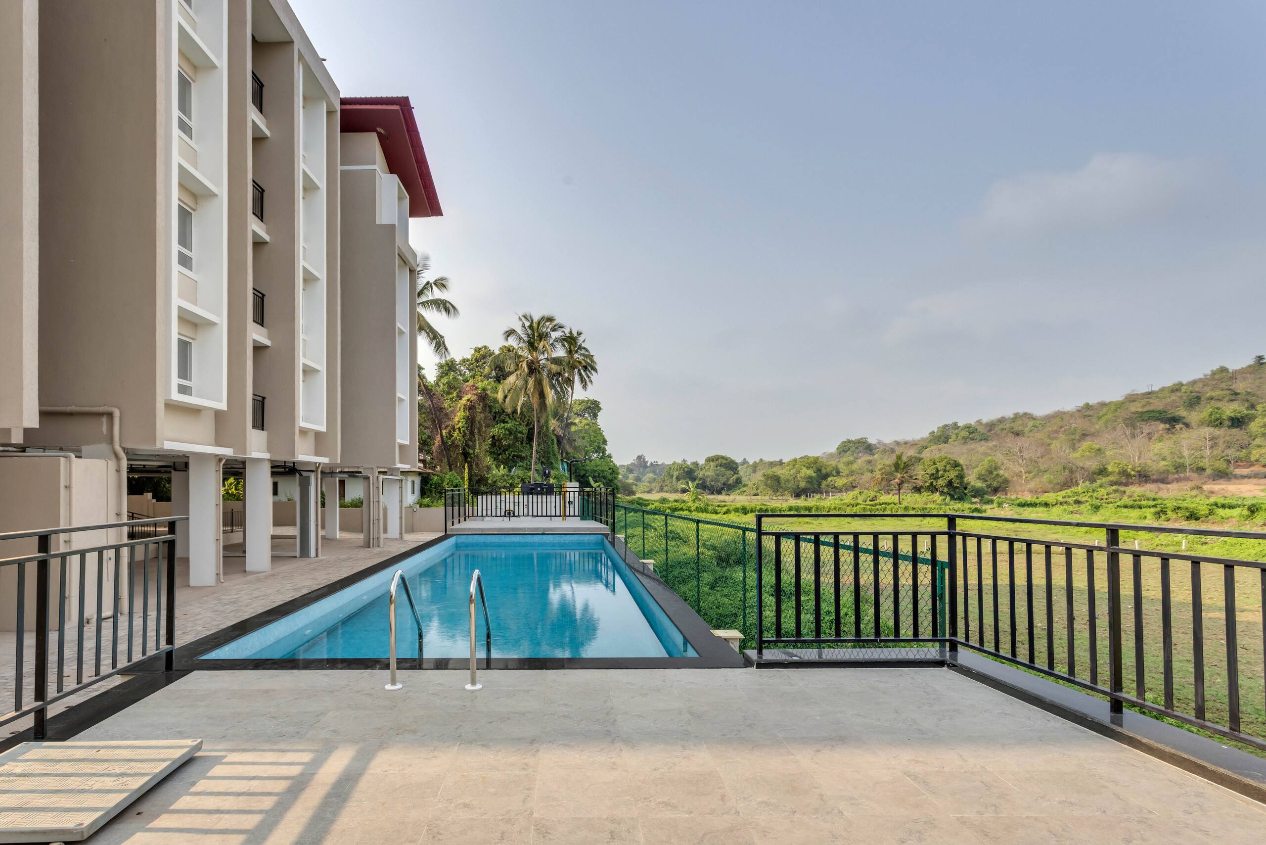 Cozy 2BR Candolim Escape | Pool, Gym & Hill Views 38