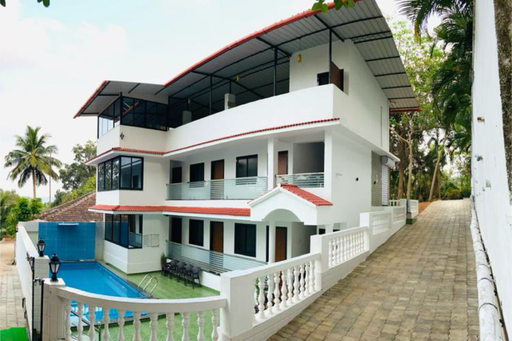 Relaxation Retreat:AC Room in Porvorim's Enclave 12