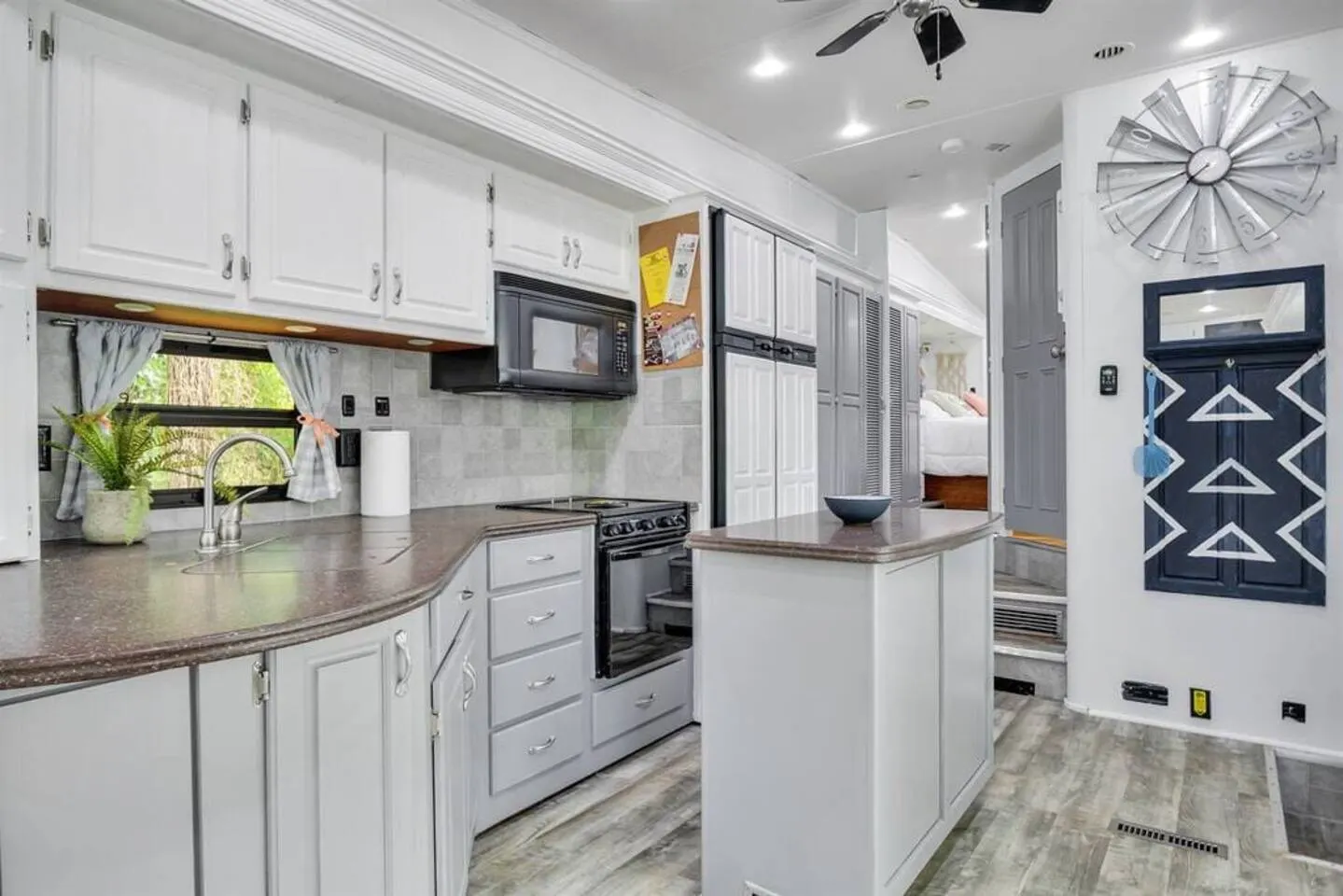 Cozy RV with Fireplace, Grill & Patio 10