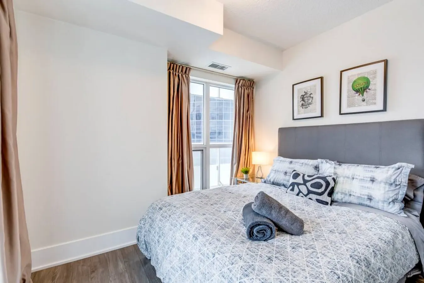 Stylish 2BR Condo Parking Prime Location 18