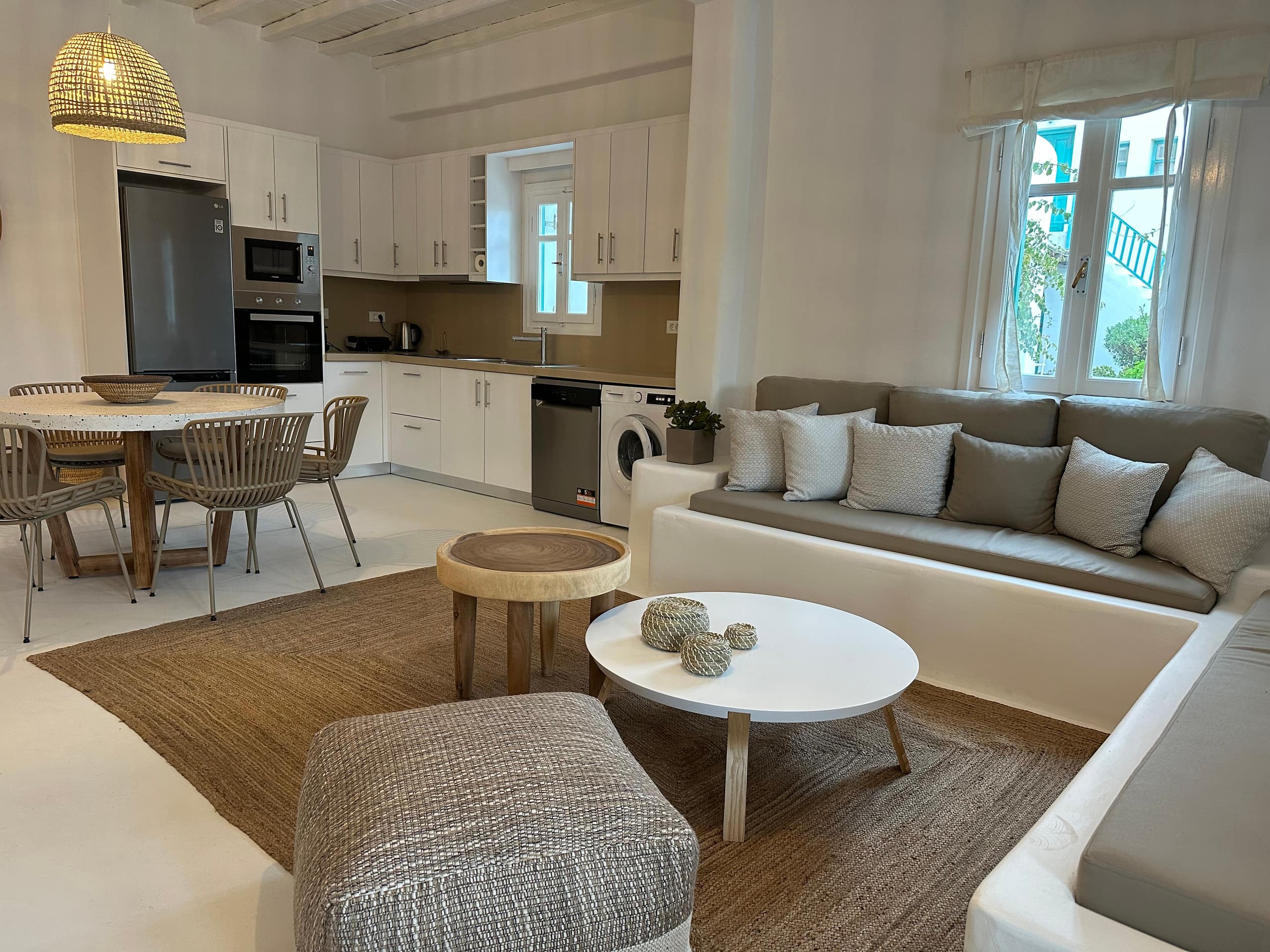 Well designed Cycladic Condo with a pool