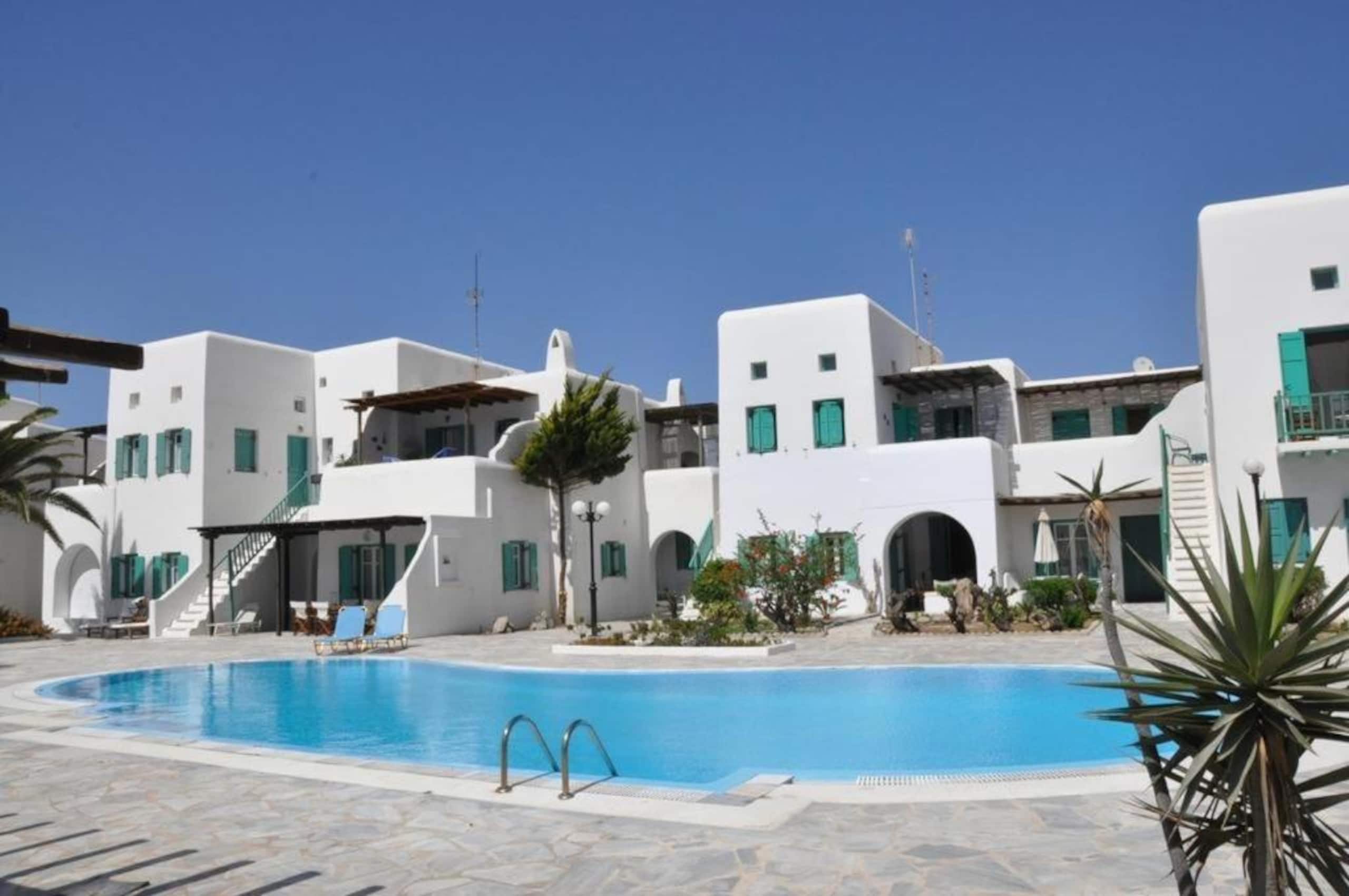Well designed Cycladic  Condo with a pool — photo 2