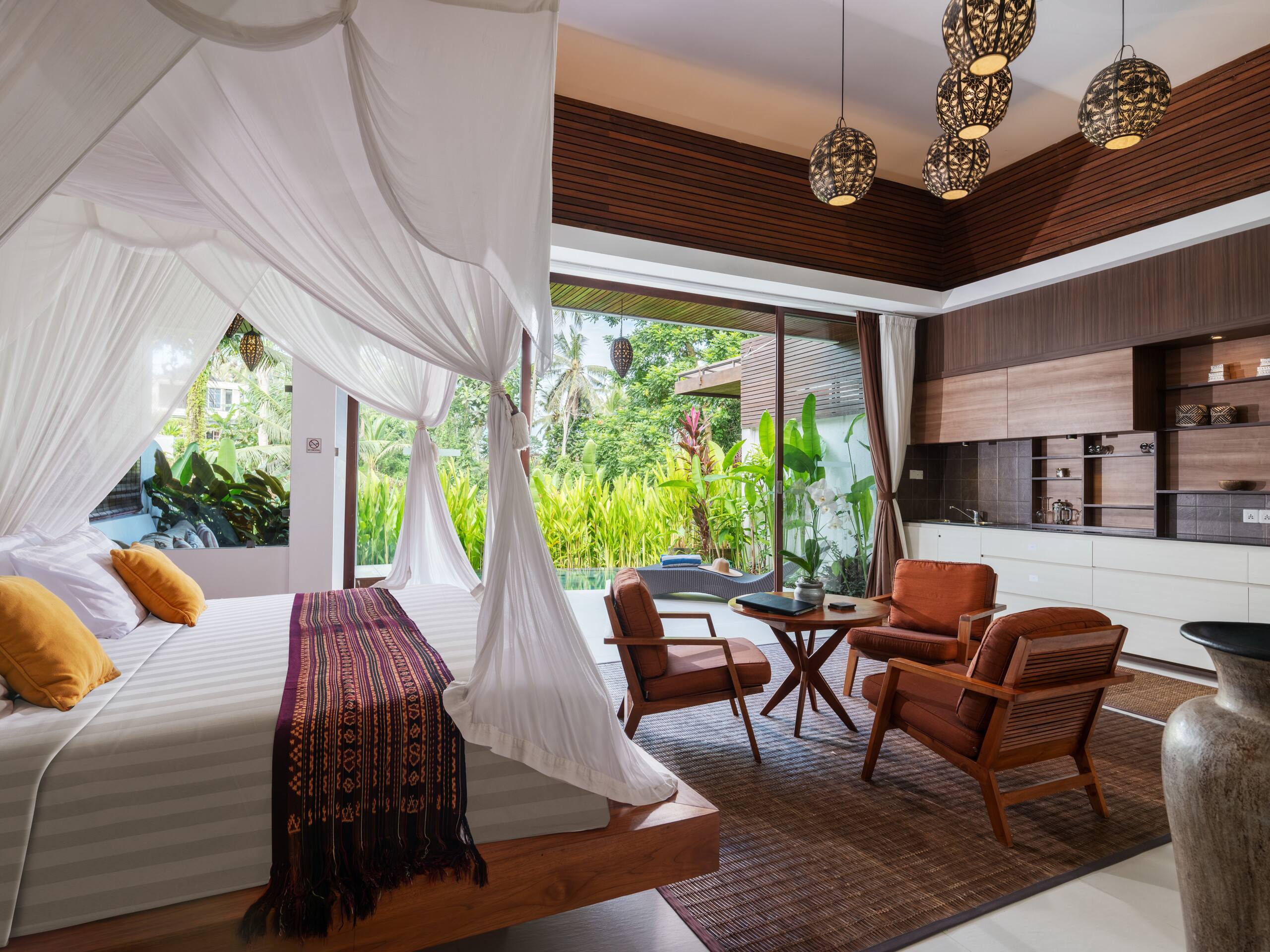 Laze on the Poolside Day Bed at an Earthy-Hued Cliffside Pad — photo 3