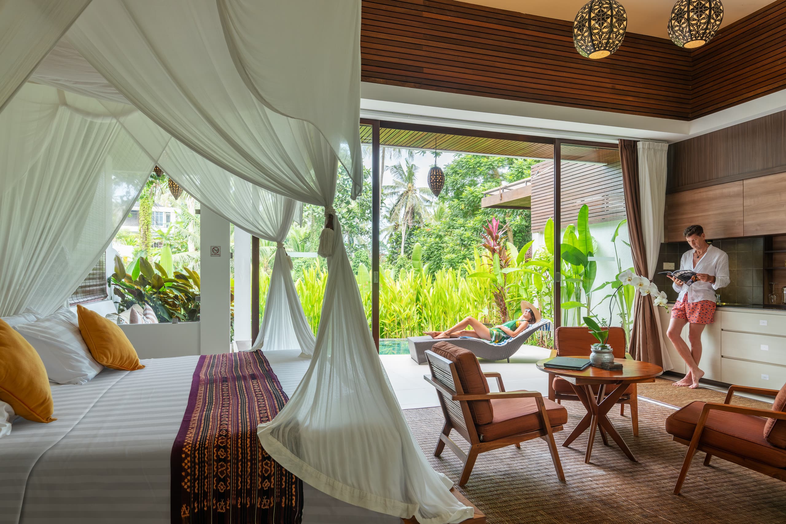Laze on the Poolside Day Bed at an Earthy-Hued Cliffside Pad — photo 2