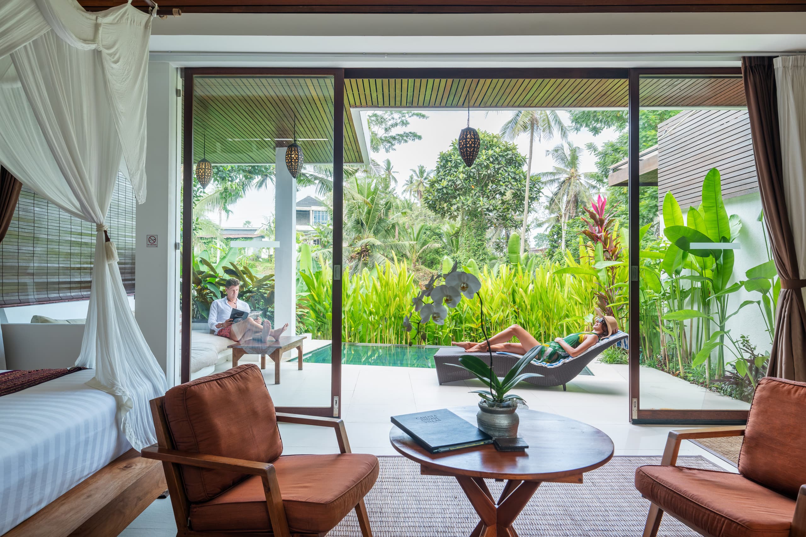 Laze on the Poolside Day Bed at an Earthy-Hued Cliffside Pad