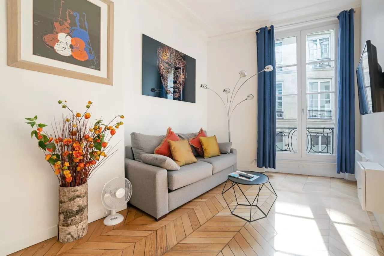 Luxe 1-BR Gem Steps from the Louvre & Opera