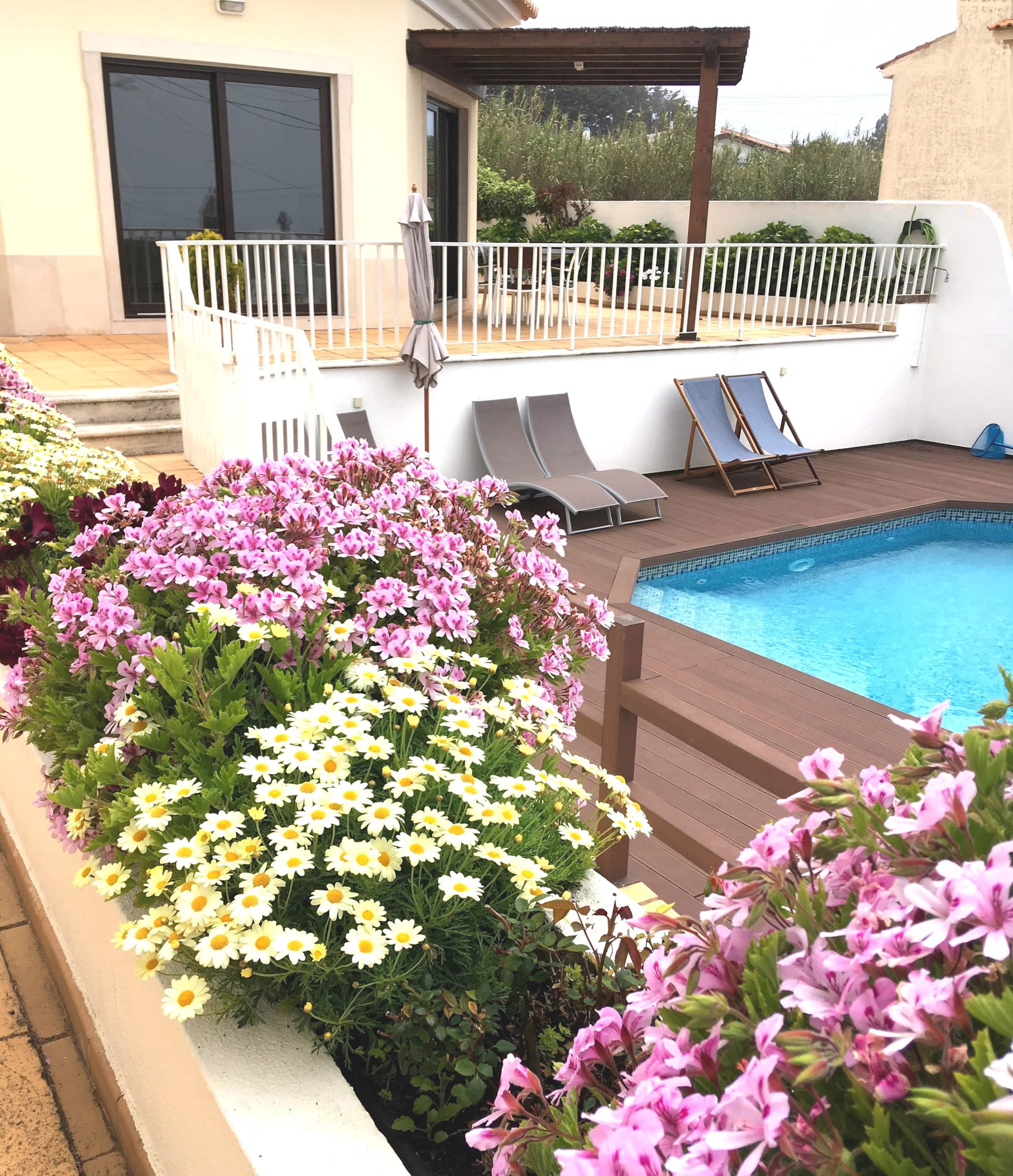Relax on the sunny pool deck. Children friendly 34