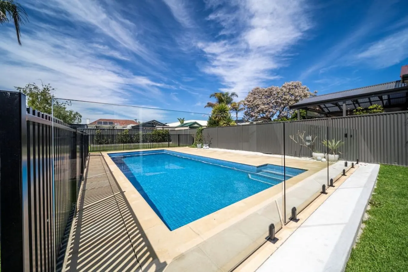 Summer Breeze—A Coastal Poolside Retreat 19