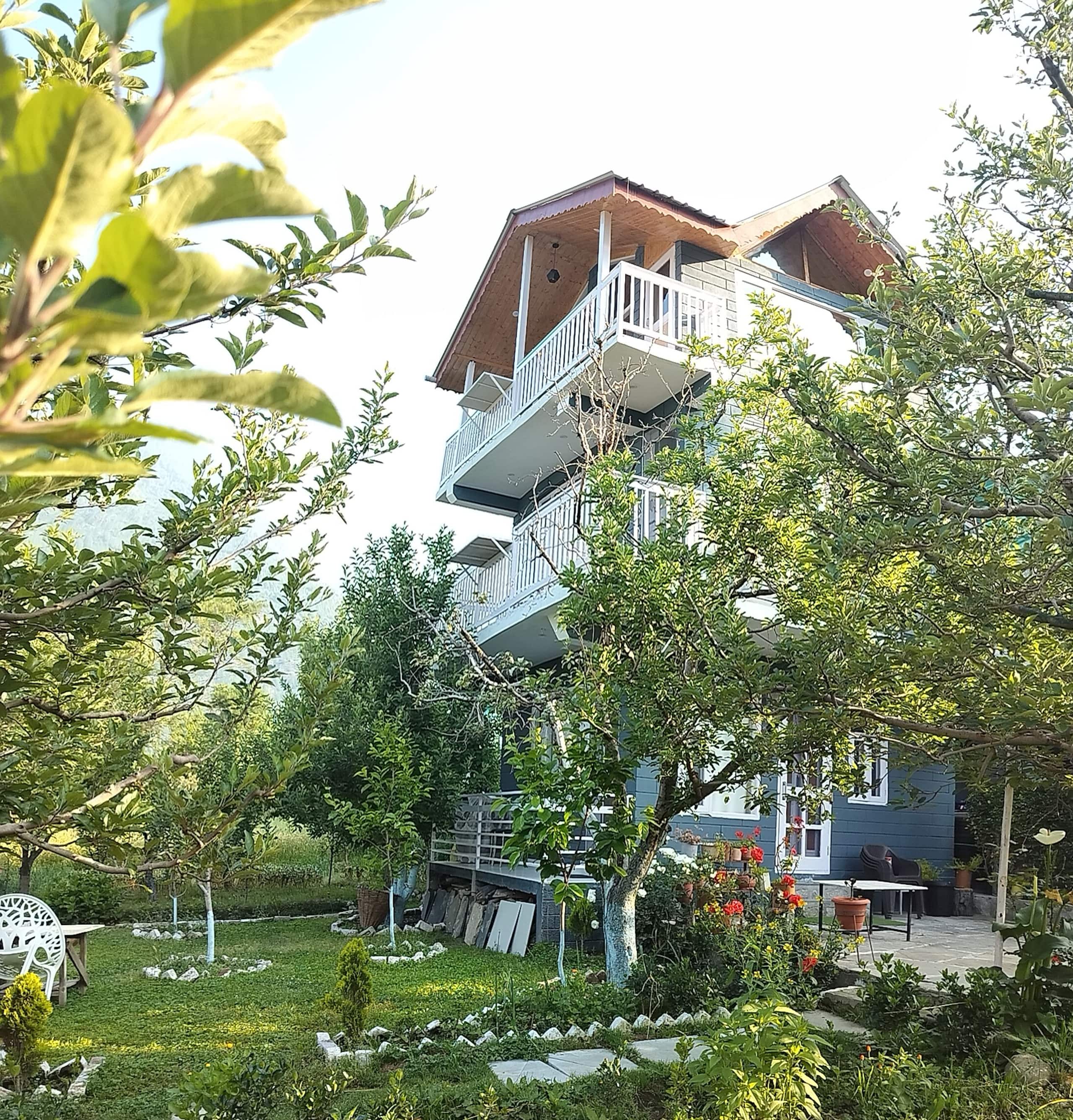 2BHK Orchard Heaven: Cozy Loft 32