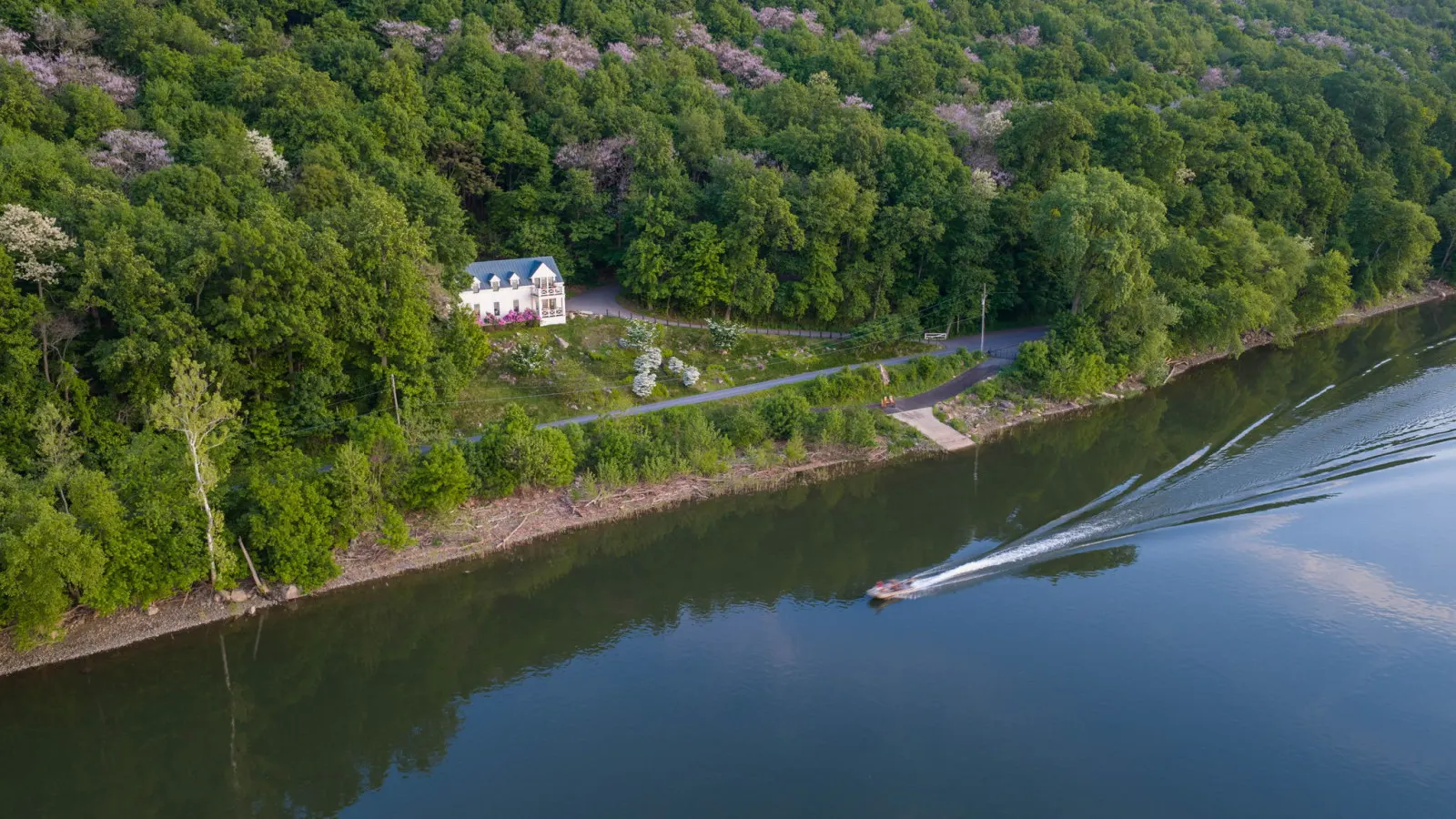The Riverfront Boathouse Getaway