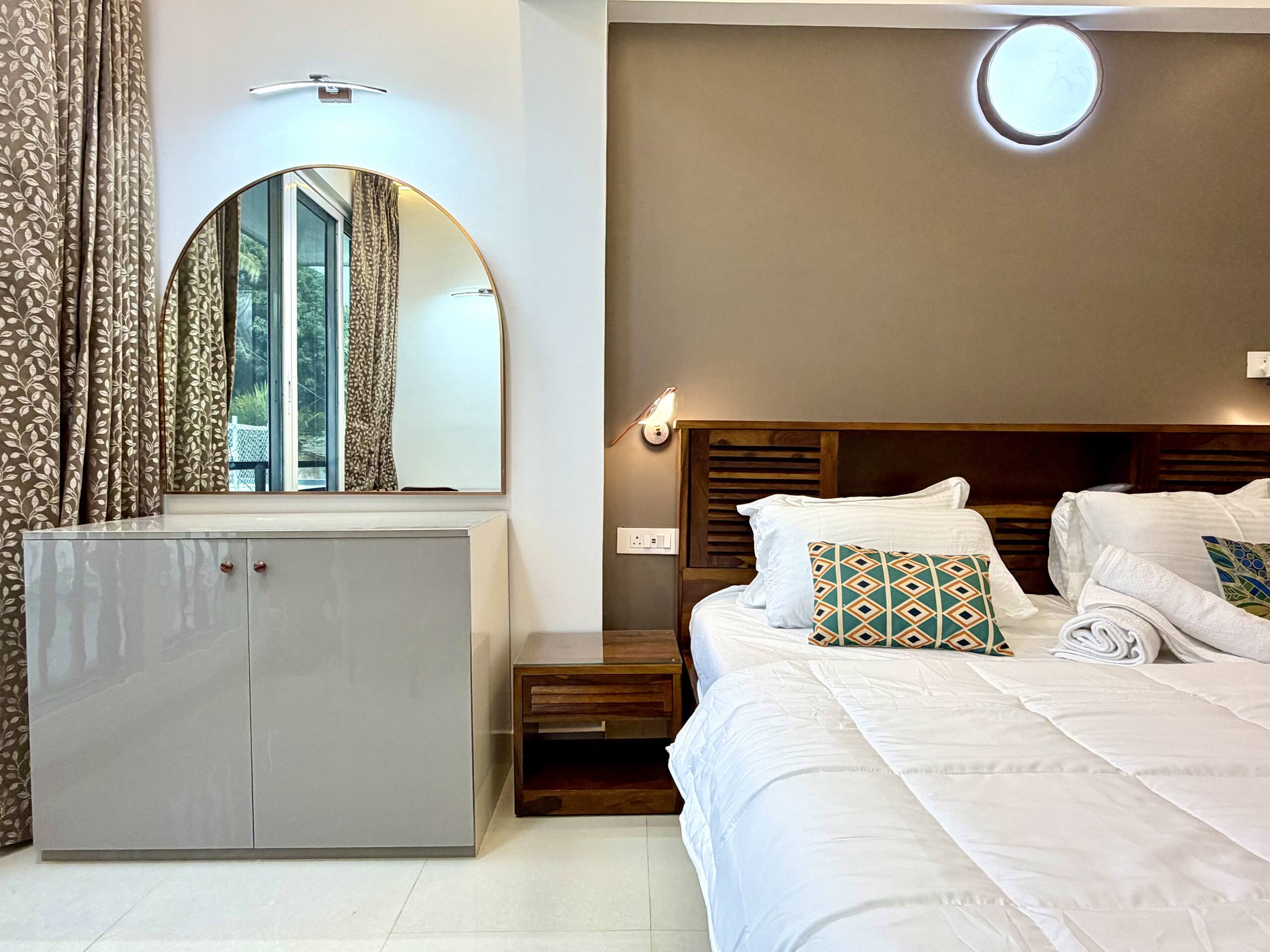 Whistling Palms by Akaya Collective | 1BHK | Pool 18