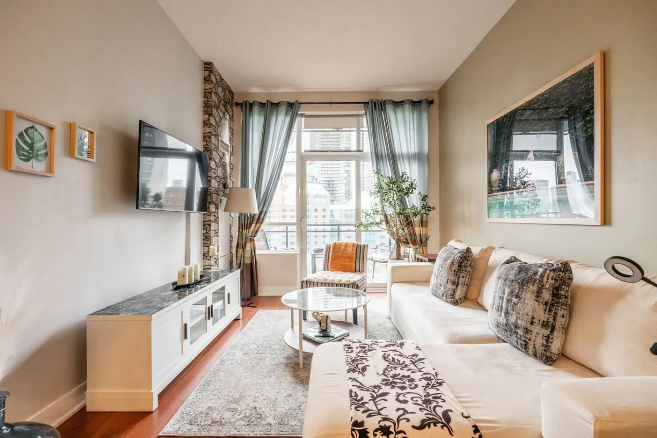 Bright Stylish Condo • Great Location • City Views