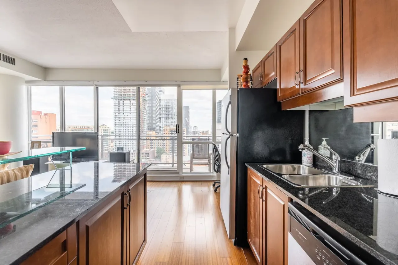 Inviting 1BR Condo Great Location City Views 14