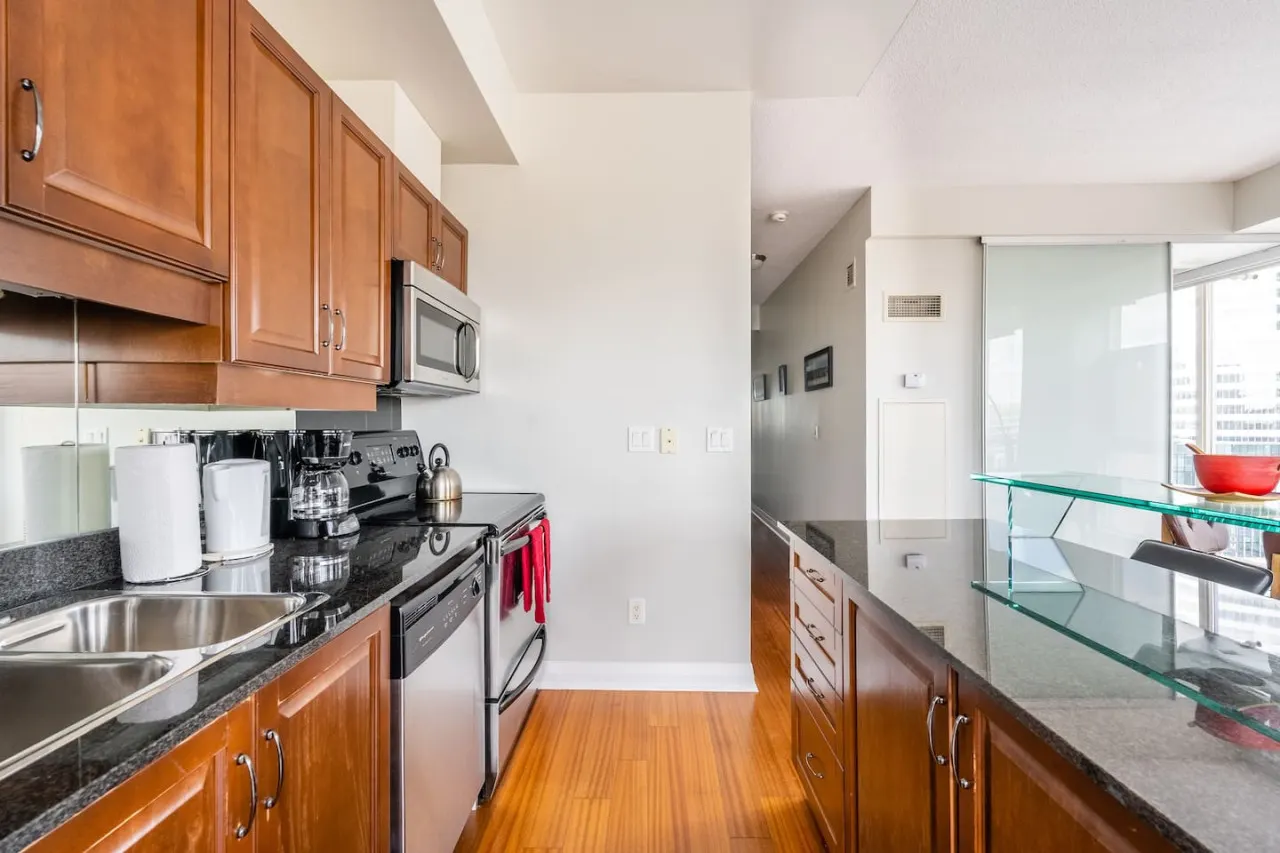 Inviting 1BR Condo Great Location City Views 15
