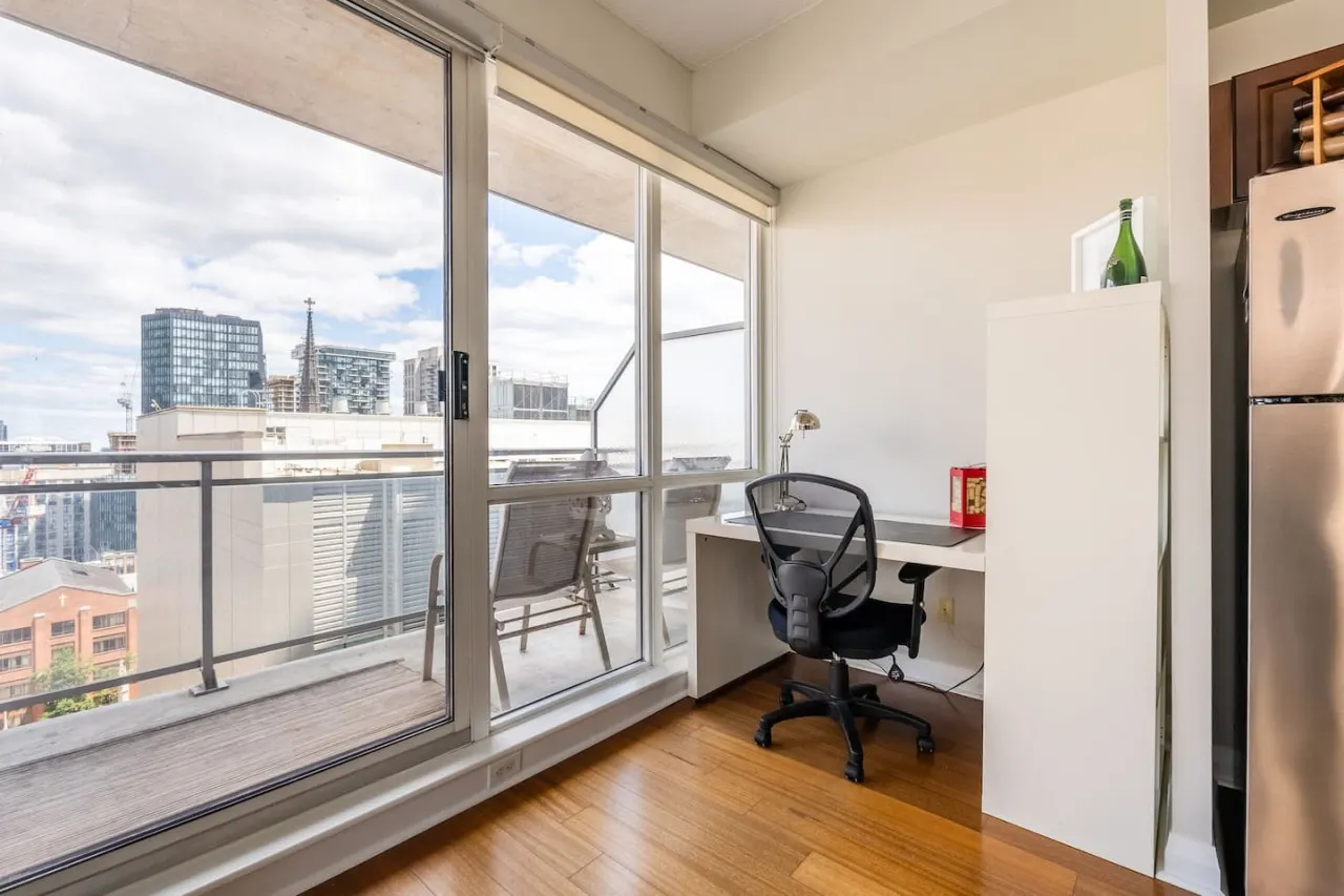 Inviting 1BR Condo Great Location City Views 18