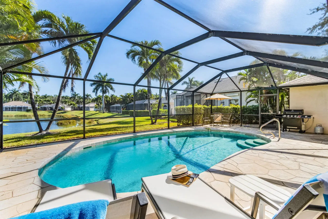 Lazy days & lake views. Beautiful Naples pool home in Briarwood 7