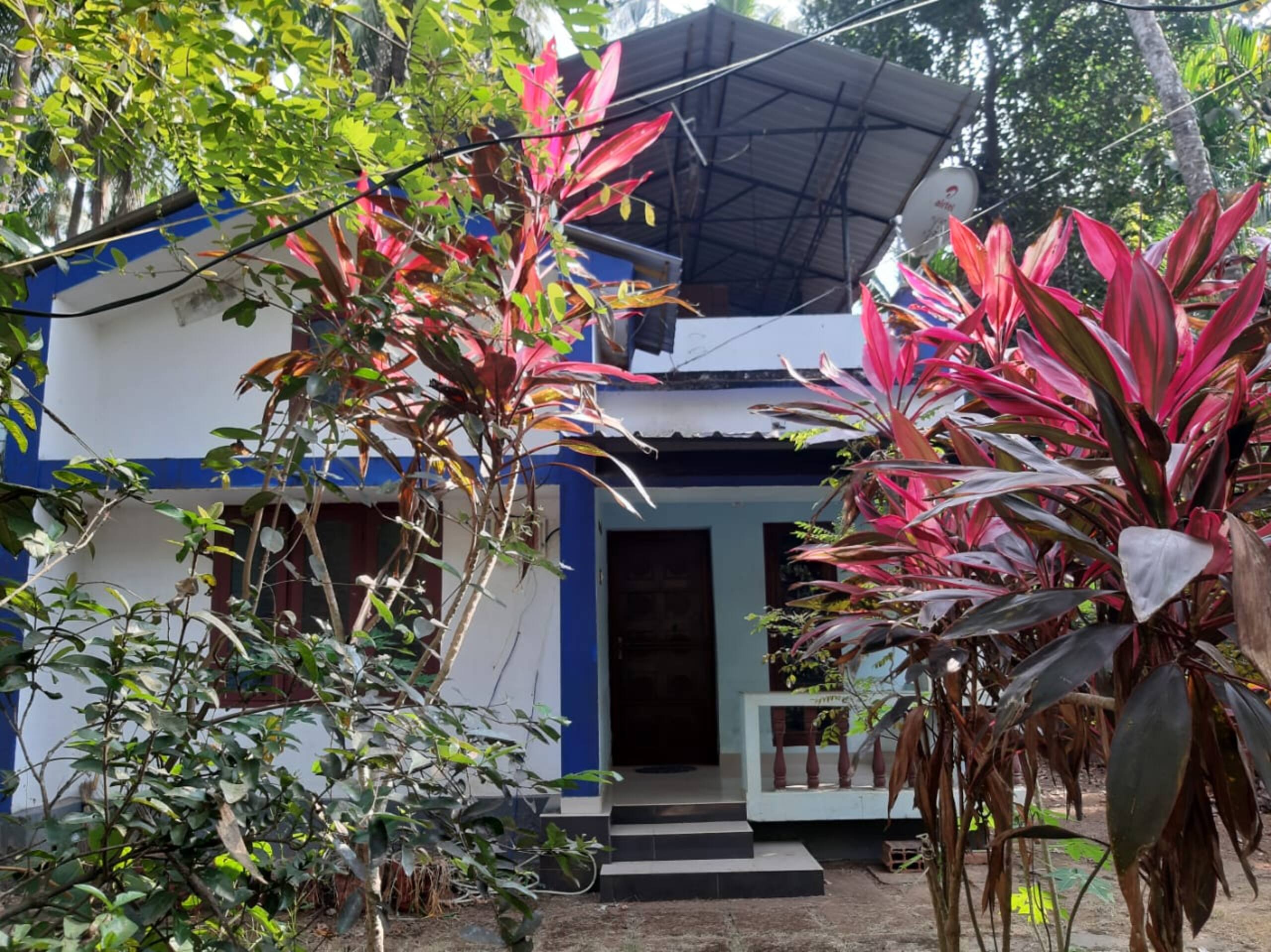 House in farm landscape near city