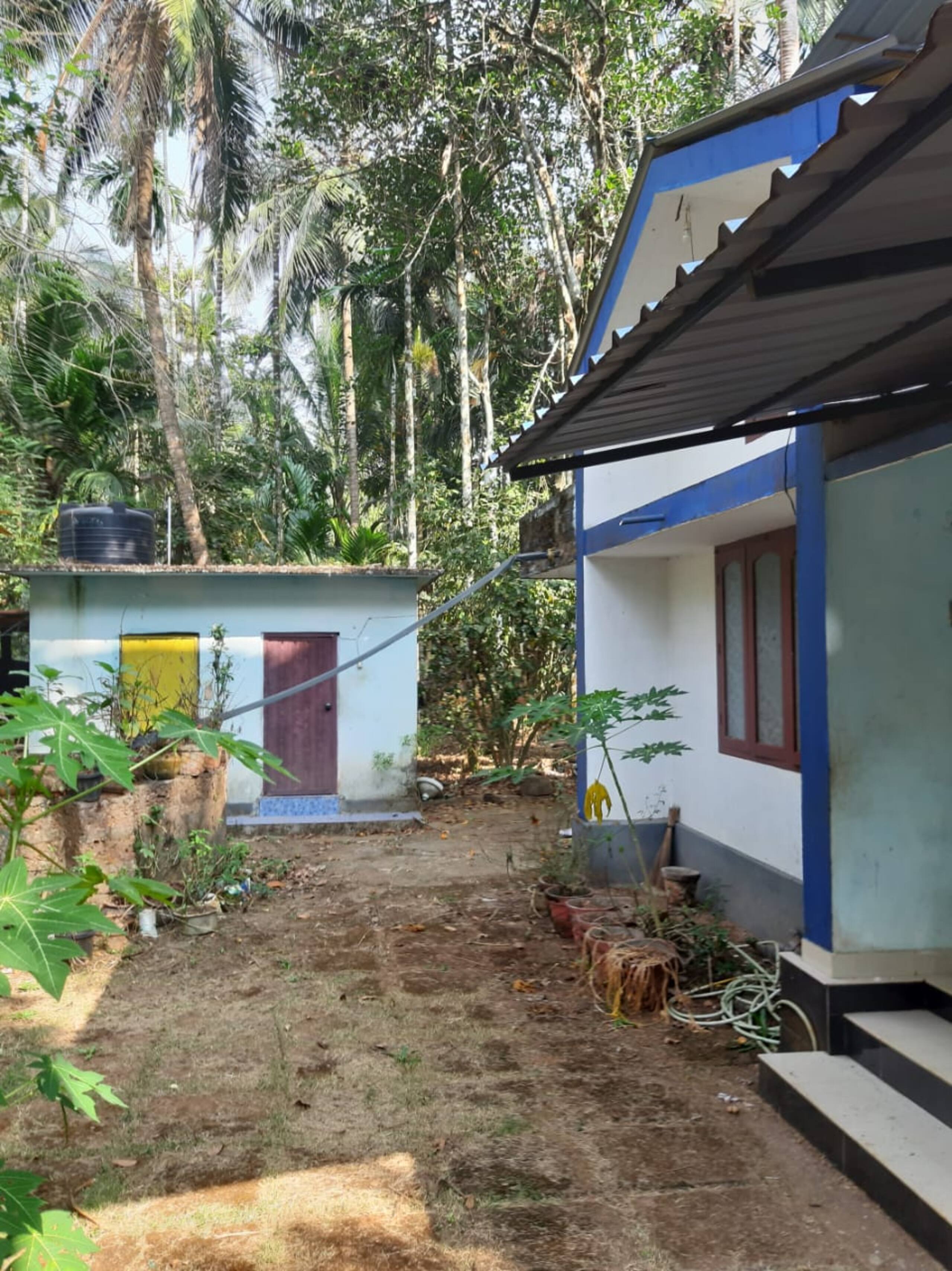 House in farm landscape near city 2