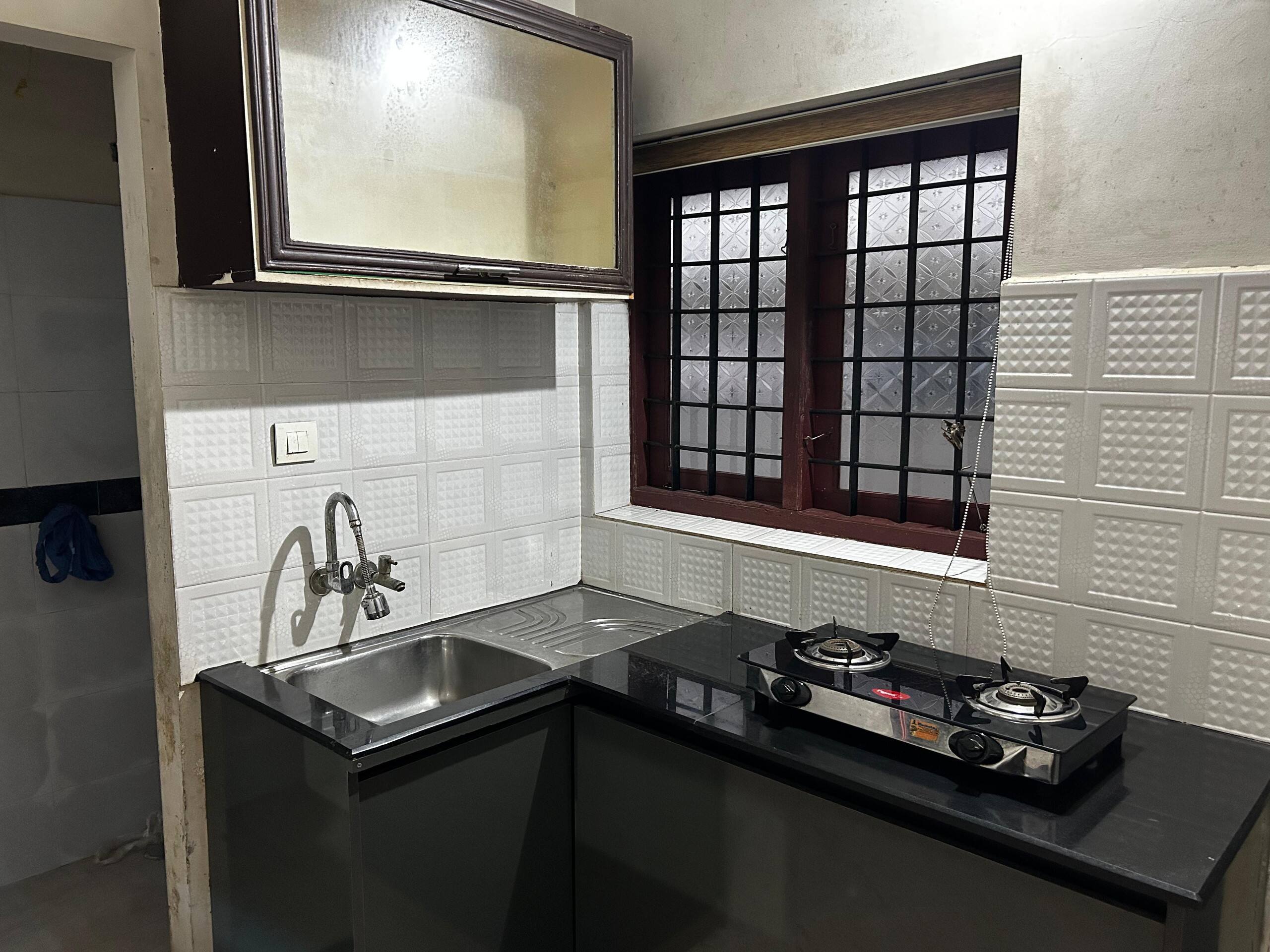 Home in Aluva –Steps Away from Metro & Bus Station 7