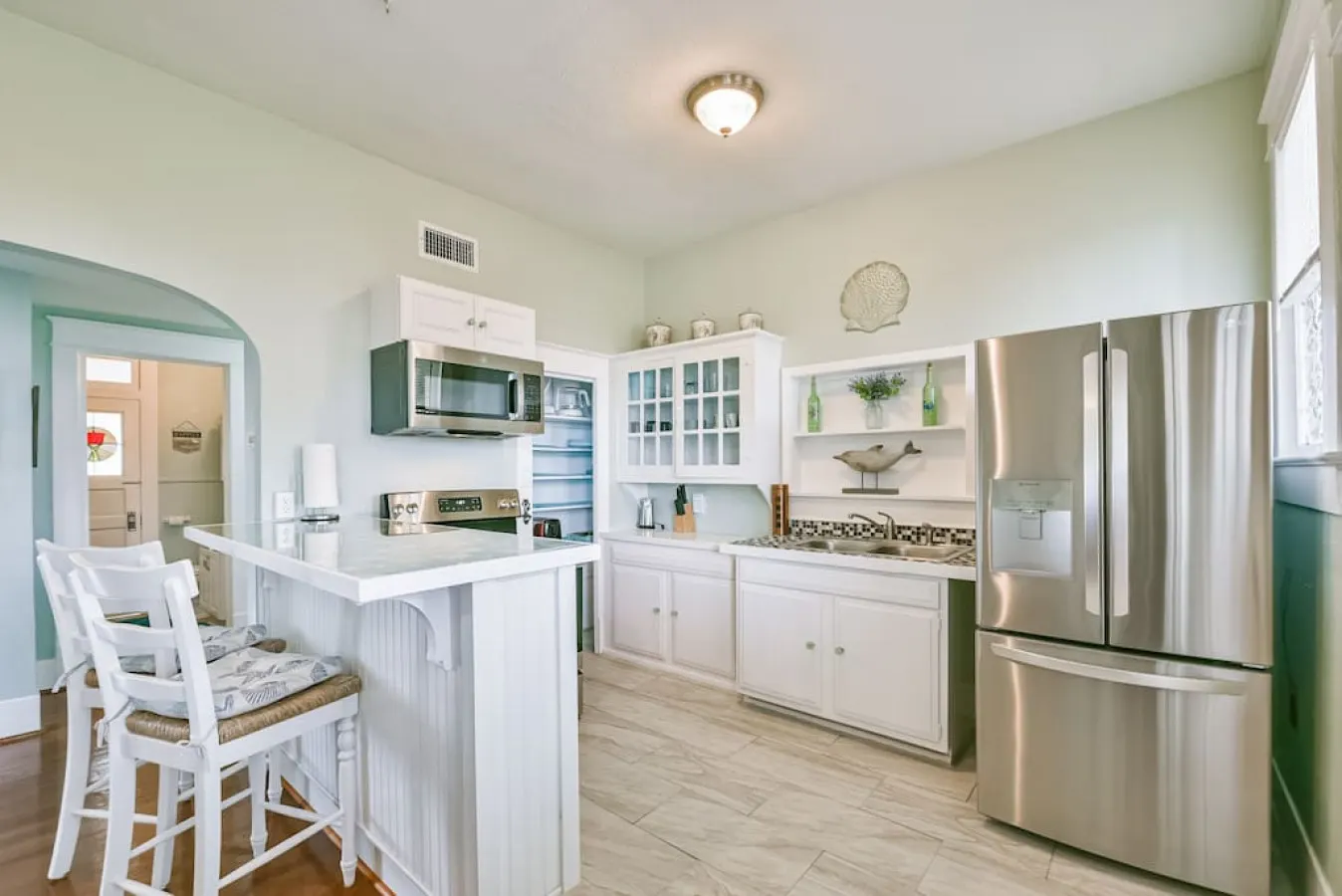 Coastal Blue Cottage is Steps to Beach and Seawall 10