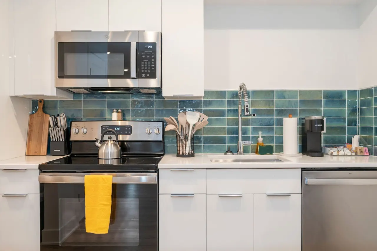 Luxury 1BR Condo: Modern Design & Prime Location 2
