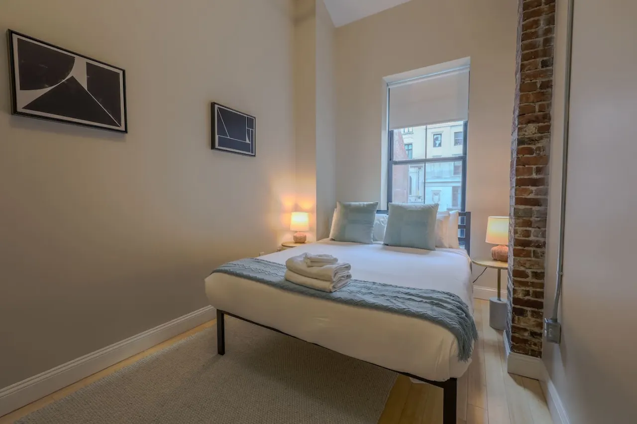 Stylish Exposed Brick 3BR! 13