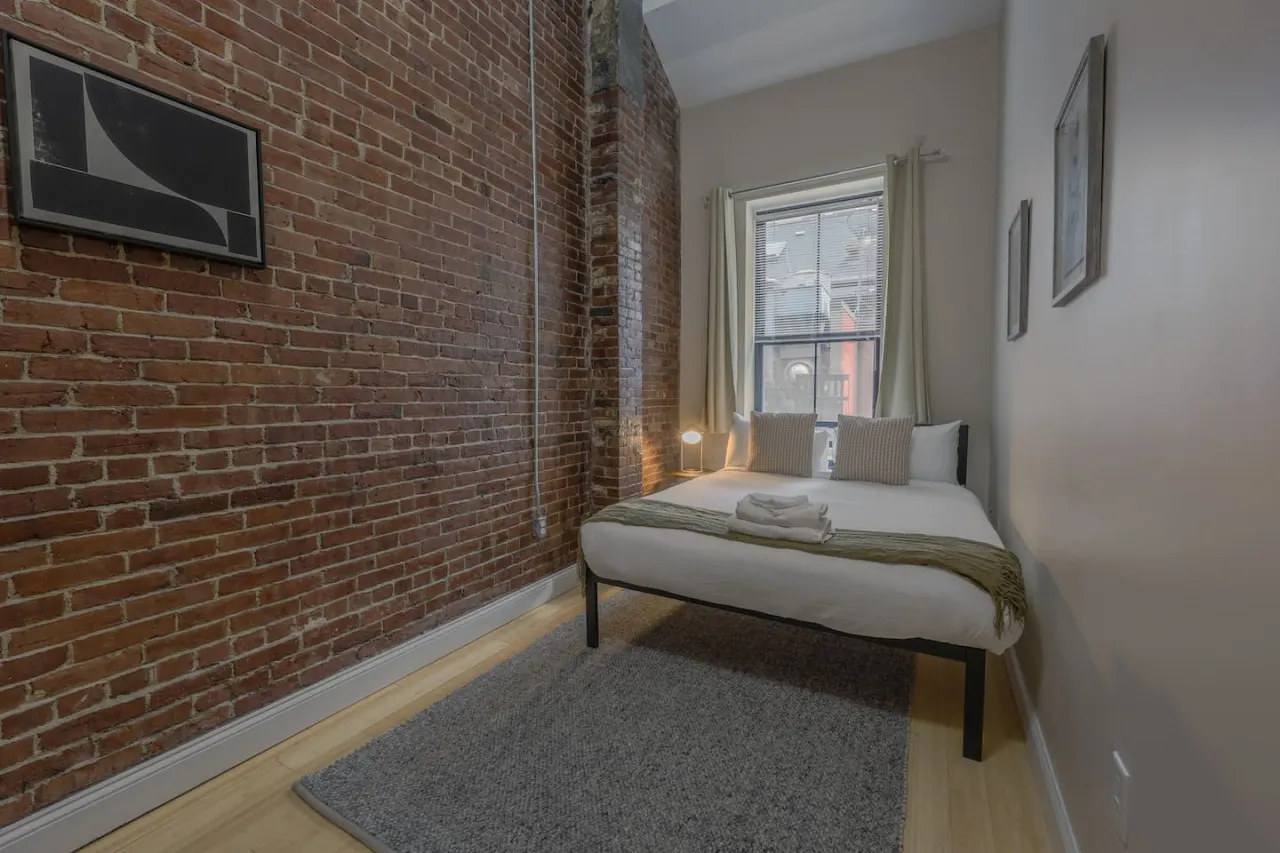 Stylish Exposed Brick 3BR! 14