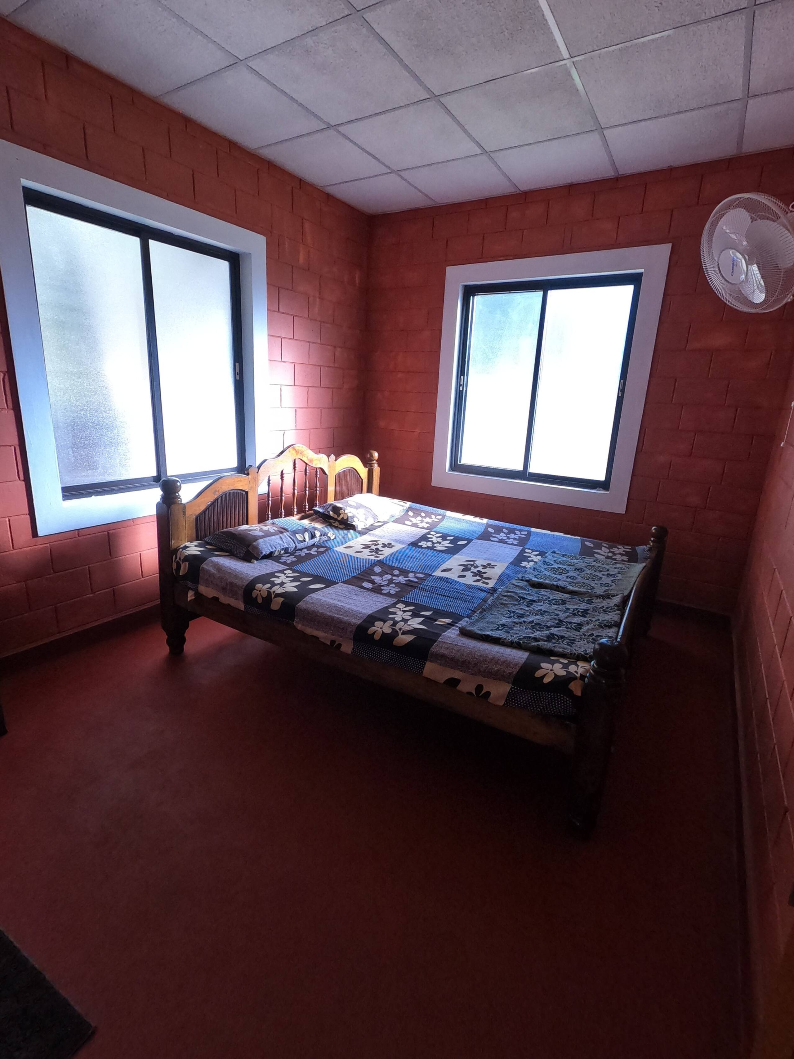 Hallimane Homestay features with a garden stay 3
